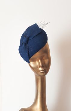 Please note that all items in my shop are made to order Unique Modern Navy Blue Felt Fascinator. Decorated with French Veil For parties and outdoors. Mounted with elastic rubber or slim headband Finished with lining and delicate petersham cotton grosgrain ribbon. Convo me with your choice. If you need any info please contact me :) --------------------------- SHIPPING INFORMATION I will ship your purchased item within 6-9 business days after receiving payment to your address. Please note that shi Fascinator With Veil, Felt Fascinator, Blue Fascinator, Navy Hats, Elegant Hats, Classic Hats, Pillbox Hat, Fancy Hats, Church Hats