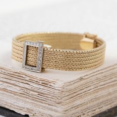 We love a jewel that is both beautiful and functional! We love how this mesh bracelet appears like any other bracelet out there but a quick flip of the lid opens to reveal a slender watch underneath. Chic, elegant, and a perfect addition to any jewelry wardrobe. 14kt yellow gold, 6.7” in length, 24.9 pennyweights.Diamonds are estimated H/I colors, VS clarities, GIA standards.Please see qualitative report for more information. Modern Mens Rings, Art Jewelry Earrings, Jewelry Wardrobe, Bespoke Rings, Antique Watches, Mesh Bracelet, Antique Engagement, Antique Engagement Rings, Mens Band