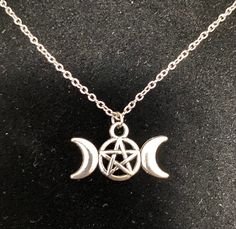 Triple moon goddess charm, alloy coated brass. Charm is about an inch long and not double sided (see pics). Chain is 18 inches and stainless steel. Symbolic Crescent Nickel-free Necklace, Symbolic Crescent Nickel Free Necklace, Nickel-free Crescent Symbolic Necklace, Symbolic Crescent Necklace Adjustable, Nickel Free Crescent Metal Necklace, Nickel-free Crescent Metal Necklace, Adjustable Crescent Metal Necklace, Adjustable Metal Crescent Necklace, Symbolic Metal Charm Necklaces