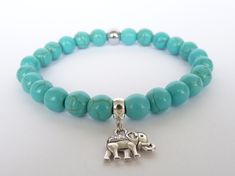 Bracelet for women Gift sister Elephant Bracelet for mom Bracelet for her, Turquoise Jewelry Turquoise Elephant Jewelry, Mint Bracelet This beautiful beaded bracelet is made with high quality 8mm Turquoise Howlite beads and Elephante charms strung on a very strong clear elastic cord. Please choose the size for your bracelet. See more bracelets here: https://www.etsy.com/shop/BonBonStones?ref=hdr_shop_menu If you have any questions please feel free to contact me Turquoise Bangle Crystal Bracelet For Gift, Turquoise Bangle Crystal Bracelet As Gift, Turquoise Crystal Bracelet With 8mm Beads As Gift, Gift Turquoise Crystal Bracelet With 8mm Beads, Turquoise Crystal Bangle Bracelet As Gift, Adjustable Turquoise Crystal Bracelet Gift, Turquoise Stretch Bangle Bracelet For Gift, Turquoise Stretch Bangle Bracelet As Gift, Turquoise Stretch Bracelet As A Gift