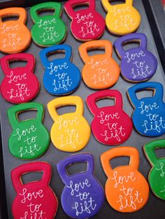 decorated cookies in the shape of kettles with love to fit written on each one