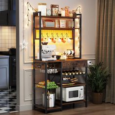 a kitchen area with a microwave, oven and shelves