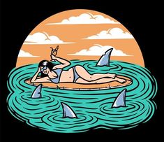 a woman laying on top of a surfboard in the ocean surrounded by shark fin