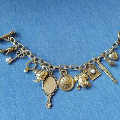 This Is A Soozi's Closet Item (A1) Description: Length Of Bracelet From End To End: Approx. 7.5" (Can Be Shortened Approx. 1") Length Of Bracelet From End To First Circle To Close The Bracelet: Approx. 6.5" This Is A Lovely Faux Antiqued Gold-Tone Charm Bracelet. There Are 11 Charms On The Bracelet (Please See Photos). Toggle Closure. New Without Tags. Please Check Out All Photos, As They Are Part Of The Description. Ask Questions. Make A Reasonable Offer, And I Will Probably Accept, Or Counter Vintage Gold Charm Bracelet, Antique Charm Bracelet, Charm Necklace Diy, Layering Bracelets, Lucky Charm Bracelet, Bridesmaid Proposals, Plastic Bangles, Diy Jewlery, Adjustable Bangle Bracelet