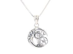 Crafted of the finest .925 Sterling Silver, this necklace showcases a Celtic Tree of Life, Crescent Moon, and a Pentacle Star all in one gorgeous piece. A Rainbow Moonstone highlights the inside branches of the tree. The highly polished pendant is strung on an 18 inch sterling silver box chain that secures with a spring ring clasp. - Metal: .925 Sterling Silver; Finish: High polish; Stone: Rainbow Moonstone; Stone measurements: 2.0 mm - Approximate Pendant dimensions: 15.4 mm wide x 25.0 mm long Sterling Silver Sun And Moon Spiritual Necklace, Sterling Silver Spiritual Necklace With Sun And Moon Design, Spiritual Sterling Silver Necklace With Sun And Moon Design, Spiritual Sterling Silver Sun And Moon Necklace, Sterling Silver Symbolic Necklace With Moon Charm, Symbolic Sterling Silver Necklace With Moon Charm, Mystical Sterling Silver Round Necklace, Sterling Silver Necklaces With Sun And Moon Design, Mystical Round Sterling Silver Necklace