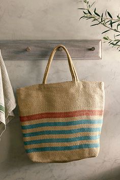 Made from hand-loomed jute and topped with colorful stripes, this roomy tote is a practical companion for the market, beach, or daily errands. | Marseille Jute Shopping Tote Bag at Terrain Jute Tote Bags, Jute Totes, Boho Bags, Boho Accessories, Market Tote, Jute Bags, Shopping Tote Bag, Woven Bag, Summer Crochet