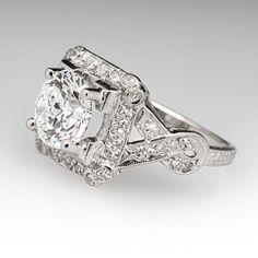 a white gold ring with diamonds on it