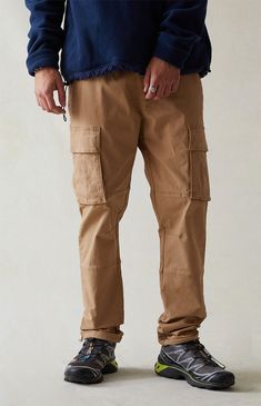 Bring any casual 'fit together with the new Eco Stretch Canvas Khaki Slim Cargo Pants from PacSun. This go-to pair is designed with an elastic stretch waistline, adjustable drawstrings, side pockets, cargo pockets, and a standard fit.

Learn more about PacSun eco items Slim Cargo Pants, Pacsun Mens, Casual Fit, Slim Legs, Casual Fits, Pacsun, Cargo Pants, Stretch Canvas, Cool Style