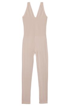 Stretchy cotton jumpsuit with a rounded V neckline. Slightly lower in back. Fitted and stretchy but soft and lightweight and not at all constricting. Fabric is 84% cotton, 11% polyamide and 5% elastane. Tiara is 5'6", bust 32", waist 26", hip 36", and is wearing a size XS/S Stretch V-neck Jumpsuits And Rompers For Loungewear, Second-skin Elastane Bodysuit For Loungewear, Stretch Elastane V-neck Jumpsuits And Rompers, Sleeveless Second-skin Elastane Unitard, Spring Elastane Bodysuit For Loungewear, Casual Stretch Jumpsuits, Stretch Elastane Jumpsuits And Rompers For Loungewear, Elastane V-neck Bodysuit For Loungewear, V-neck Elastane Bodysuit For Loungewear