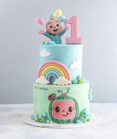 a birthday cake with a cartoon character on top