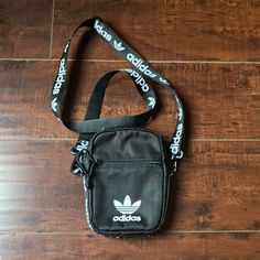 New With Out Tag Adidas Crossbody Bag . Black Color . Zipper Closure Rectangular Shoulder Bag With Zipper For Streetwear, Streetwear Crossbody Shoulder Bag With Zipper Closure, Black Shoulder Bag With Zipper For Streetwear, Black Sporty Shoulder Bag With Zipper, Sporty Black Shoulder Bag With Zipper, Sporty Black Shoulder Bag With Zipper Closure, Streetwear Shoulder Bag With Zipper Pocket, Black Bags With Zipper Closure For Streetwear, Black Streetwear Bag With Zipper Closure