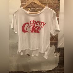 Very Lana Del Rey Core. Cherry Cola Coke Crop Top Never Worn Vintage Tan Short Sleeve Tops, Vintage Style Tan Cotton Tops, Summer Tan Tops With Screen Print, Tan Screen Print Tops For Summer, Casual Tan Screen Print Top, Summer Graphic Tee Shirt In Tan, Tan Graphic Tee For Summer, Tan Graphic Tee Shirt For Summer, Lana Del Rey Core