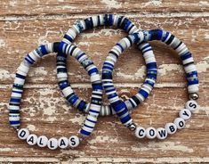 These bracelets are perfect to show off your team spirit! What I love most about the NFL collection is that none of the sets are the same!  I use a mixture of the teams colors and randomly string the beads!  Set of 3 These bracelets are 100% handmade with stretch cord to go over your hand. Overstretching may cause breakage. I use Sterling Silver plated and Stainless-Steel beads that should not tarnish if taken care of. That means avoiding water, lotions, sweating, sanitizer, etc. Sizing: If you Blue Beaded Bracelets For Team Spirit Gift, Cowgirl Clay Bracelet, Blue Adjustable Bracelets For Team Spirit, Western Clay Braclets, Adjustable Multicolor Beaded Bracelets For Team Spirit, Blue Team Spirit Beaded Bracelets As Gift, Blue Adjustable Beaded Bracelets For Team Spirit, Personalized Multicolor Beaded Bracelets For Team Spirit, Blue Beaded Bracelets With Letter Beads For Team Spirit