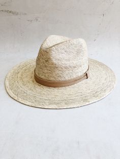 A stunning sun hat with beautiful felt detailing. Take this beauty on vacations, to the beach, the farmers market or brunch on a sunny morning. Its the perfect companion to any outfit. Spring Coastal Boater Hat Made Of Toquilla Straw, Summer Fedora Panama Hat Made Of Palm Leaf, Summer Brimmed Sun Hat Made Of Palm Leaf, Natural Panama Hat For Travel With Beachy Style, Summer Brimmed Straw Hat For Travel, Summer Travel Straw Hat With Brim, Natural Summer Hats For Travel, Handmade Straw Hat For Spring Vacation, Natural Coastal Style Hats For Travel