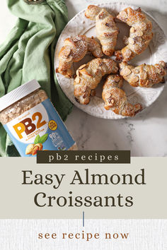 easy almond croissants on a plate next to a jar of peanut butter