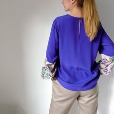 Digital Sewing Pattern for beginners for Women's Relaxed fit blouse with contrast voluminous/loose-flowing style sleeves, with elasticated ends tightly at the wrist. Stretch Long Sleeve Blouse With Gathered Sleeves, Long Sleeve Stretch Blouse With Gathered Sleeves, Stretch Long Sleeve Blouse With Elastic Sleeves, Stretch Blouse With Elastic Sleeves For Work, Stretch Blouson Sleeves Blouse For Work, Stretch Blouson Sleeve Workwear Blouse, Long Sleeve Blouse With Gathered Sleeves, Stretch Blouse With Blouson Sleeves For Work, Stretch Blouse With Balloon Elastic Sleeves