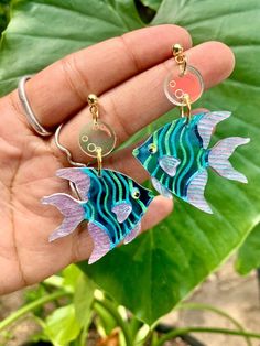 These totally fin-tastic beauties will have you feelin' like you're floating through a coral reef, even if you're just stuck in traffic. ✨ ✦ Lightweight, acrylic laser-cut earrings finished with gold plated stainless steel ball posts, making them hypoallergenic and safe for most ears. ✦ Measures approximately 2 x 1.5". ✦ Handmade with love in Louisville, KY. Beach Beads, Shrinky Dink Earrings, Bubble Fish, Fish Earrings, Accessorize Bags, Laser Cut Earrings, Acrylic Jewelry, Cut Earrings, Mermaid Earrings