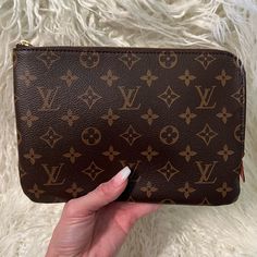 The Lv Etui Voyage Pouch Is A Super Rare Pouch, Similar In Size To The Neverful Mm & Gm Pouches. This Pouch Is In Pristine Condition, I Used It Once For An Event And That Was The Only Time It Left Its Dust Bag, It Is Basically Nwot. There Are No Imperfections (Scratches, Stains, Marks, Tears, Odors, Etc.). The Bag Isn’t As Stiff As The Pochettes, So You Can Fit All Of Your Essentials, Without Damaging The Bag. It Is Meant To Be Used As A Clutch, A Storage Bag Inside Of Another Bag, Or A Travel B Monogram Canvas Clutch With Removable Pouch, Monogram Canvas Clutch For Daily Use, Designer Monogram Canvas Pouch Clutch, Daily Use Monogram Canvas Clutch, Designer Monogram Canvas Pouch, Classic Monogram Canvas Pouch For Everyday Use, Luxury Brown Clutch With Zipper Pouch, Luxury Clutch With Removable Pouch In Monogram Canvas, Luxury Monogram Canvas Clutch With Removable Pouch