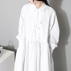 Item Code2329172672574Material63%Cotton,37%Complex FiberProduct Details:·Casual·Peter Pan Collar·Solid Color·Bowknot,Spliced·Long SleeveOne Size(Fit for EU 38-40,US8-10,UK12-14,AU12-14,NZ12-14)Length: 123.00 cm/ 48.43 "Bust: 118.00 cm/ 46.46 "Shoulder: 44.00 cm/ 17.32 "Sleeve Length: 61.00 cm/ 24.02 "The model height:5'5"/168cm,weight:108lb/49kgbust:86cm,waist:66cm,hips:88cmPS:1.The measurement is measured by hands,there will be 1 cm-3cm in error,hope you can understand.2.The product is taken in White Long Sleeve Shirt Dress For Spring, Casual White Collared Dress, Casual White Midi Length Shirt Dress, White Cotton Shirt Dress For Spring, Casual White Dress With Tie Waist, Cotton Long Sleeve Shirt Dress With Tie Waist, Cotton Shirt Dress With Tie Waist And Long Sleeves, Casual Cotton Dresses With Tie Waist, Casual Long Sleeve Shirt Dress With Tie Waist