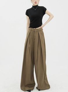 Infuse elegance into your wardrobe with our Wide Leg Criss-Cross Pleated Palazzo Trousers, a harmonious blend of comfort and chic.
Crafted with attention to detail, these trousers feature a high-waist cut for a flattering silhouette and come in a timeless black shade. Asymmetrical pleats add a touch of uniqueness, while the fluid fabric encapsulates a modern, commute-friendly vibe. They're perfect for both a professional setting and casual outings.
Pair them with a fitted blouse for work or a re Blouse For Work, Trousers With Belt, Fitted Blouse, Palazzo Trousers, Black Shade, Work Blouse, Shades Of Black, Wide Leg Trousers, Bottoms Pants