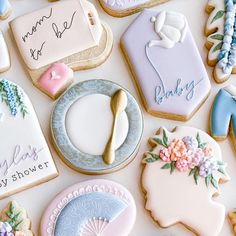 some decorated cookies are sitting on a table