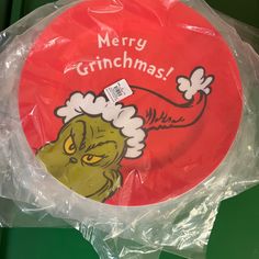 a plastic bag with a grinchmas design on it