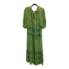 This Beautiful Dress Is Brand New And Still Has The Tag On It! This Dress Has A Beautiful Pattern And Has Two Strings With Beautiful Beads On The Sides Of The Dress! Bohemian Green Midi Dress With Short Sleeves, Green Bohemian Short Sleeve Midi Dress, Green Silk Short Sleeve Midi Dress, Casual Silk Midi Dress With Short Sleeves, Green Viscose Maxi Dress For The Beach, Green Viscose Maxi Dress For Beach, Green Long Floral Print Dress, Flowy Green Rayon Maxi Dress, Long Green Floral Print Dresses