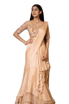 Beige pre-draped saree in a solid base with tiered layers and side drape. Comes with padded blouse embellished with 3D floral sequin and beads. - Aza Fashions Elegant Choli With Draped Sleeves And Traditional Drape, Elegant Draped Saree With Resham Embroidery, Elegant Draped Lehenga With Cutdana, Elegant Draped Semi-stitched Sharara, Elegant Silk Sharara With Draped Style, Elegant Draped Sharara For Diwali, Elegant Draped Silk Sharara, Elegant Draped Sharara For Receptions, Elegant Draped Semi-stitched Choli