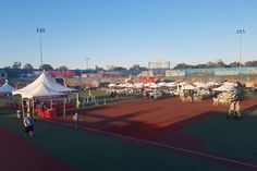 tents set up on the field for an event