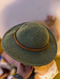 This handmade hat is the picture of versatility. Its cotton construction makes it soft, washable, light, and crushable! It can be stuffed in a backpack, thrown in the washer, rolled in the snow or mud, and will always bounce back to its original sturdy shape. The leather brim is removable for washing. Sized for babies between 6 months and 2 years, this hat fits a head circumference between 16 and 18 inches. Green Brimmed Hat For Everyday Wear, Green Brimmed Everyday Hat, Lightweight Outdoor Hat, Lightweight Casual Crochet Hat For Outdoor, Lightweight Adjustable Crochet Hat For Casual Wear, Adjustable Lightweight Casual Crochet Hat, Casual Lightweight Adjustable Crochet Hat, Casual Adjustable Lightweight Crochet Hat, Adjustable One-size Travel Hat