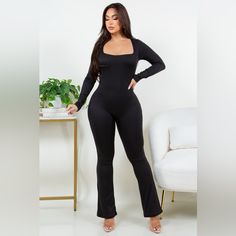 Long Sleeve Spandex Jumpsuit With Bell Bottoms Style Black Stretch Jumpsuits And Rompers In Elastane, Stretch Elastane Jumpsuits And Rompers For Night Out, Stretch Elastane Jumpsuit For Night Out, Sleek Black Stretch Jumpsuits And Rompers, Sleek Black Elastane Jumpsuits And Rompers, Black Elastane Jumpsuits And Rompers For Work, Black Elastane Jumpsuit For Work, Black Elastane Jumpsuits For Workwear, Fitted Elastane Jumpsuits And Rompers For Work