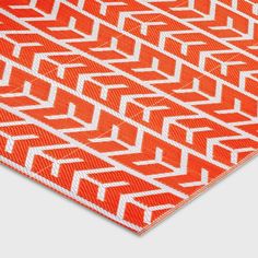 an orange and white patterned fabric