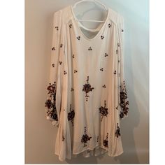 Free People Floral Dress, Never Worn Spring White Boho Print Mini Dress, White Boho Print Mini Dress For Spring, White Bohemian Rayon Dress, White Floral Embroidered Dresses For Fall, Bohemian Floral Embroidered Dress, Spring Boho Print Rayon Dresses, White Tunic Fall Dresses, White Tunic Dress For Fall, White Long Sleeve Rayon Dress