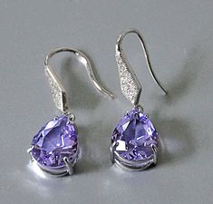 "Shop Lilac Earrings Sterling Silver, Lavender Glass Earrings Dangle, Bridal Earrings, Bohemian Crystal Jewelry Treat yourself to a pair of sparkling earrings. They will add a perfect touch of flair to your special occasion or everyday dress. These light earrings are made from: - Lilac teardrop glass stones set in silver frame - Sterling silver with cubic zirconium French hook ear wires The earrings are 1 1/4\". Lavender glass earrings will make a great gift. Your order will be mailed within 2 b Lilac Earrings, Teal Earrings, Bohemian Crystal, Mother Jewelry, Light Earrings, Opal Earrings Stud, Earrings Bohemian, Sparkle Earrings, Jewelry Birthday