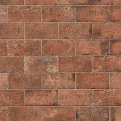 a brown brick wall with no mortars on it