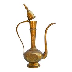 an antique brass coffee pot with a teapot shaped like a bird on the top