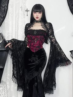 This vintage gem corset features lace patchwork, a lace-up ribbon, and a cross pendant, all adorned with beautiful vintage gems. Made of high-quality polyester spandex, it comes in the eye-catching colors of red and blue and is available in sizes S, M, and L. Lace patchwork, Lace-up ribbon, Cross pendant, Vintage gem d Gothic Goddess, Ribbon Cross, Layered Sleeves, Party Crop Tops, Gothic Tops, Trumpet Sleeves, Lace Bolero, Vintage Goth, Black Flare