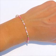 This bracelet is for all the pink lovers! Would be perfect for stacking or even on its own! "Barbie's World" would make a perfect gift. For maximum wear time avoid getting wet. Gift Stretch Bracelet With Tiny Beads, Adjustable Pink Friendship Bracelets, Dainty Pink Jubilee Bracelet, Adjustable Pink Stackable Friendship Bracelets, Pink Stackable Beaded Bracelets As Gift, Stackable Pink Beaded Bracelets, Adjustable Stackable Pink Friendship Bracelets, Hypoallergenic Pink Beaded Bracelets For Friendship, Pink Hypoallergenic Beaded Bracelets