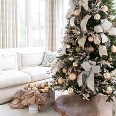 a decorated christmas tree in a living room