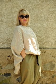 "Linen Tunic Shirt, Women Linen Shirt, Linen Clothing ☆ New collection! Beige 100% LINEN top! Casual linen tunic. Handmade loose shirt. Beige ORGANIC oversize Tunic,Top,Blouse Excellent style for spring and summer! This loose and comfy stylish Kaftan is adding elegant and fashion touch in your everyday life. Perfect solution for your everyday outfit. Be creative and different! ◾Quality NATURAL linen fabric. ◾Fabric: 100% Linen ◾Care: Wash in plenty of cold (+25/+30oC) water Use diluted detergent Casual Tunic Blouse With Buttons, Beige Relaxed Fit Tops With Button Cuffs, Casual Beige Blouse With Button Cuffs, Beige Linen Lagenlook Top, Casual Beige Tunic Top, Oversized Beige Buttoned Top, Casual Tunic With Relaxed Fit And Batwing Sleeves, Casual Beige Tunic With Relaxed Fit, Relaxed Fit Lagenlook Blouse For Beach