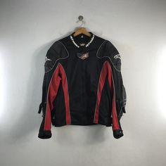 PLEASE READ DESCRIPTION BELOW BEFORE BUYING👇🏻 *ITEM:Alpinestars Racing Jacket *ITEM DETAILS: 👇🏻 Please be aware that all vintage items will usually show a few signs of wear or fading due to age, but anything visible such as stains or holes, and serious flaws have been photographed.For any further information on this item please contact us and we will be happy to help. *SIZE:LARGE *ACTUAL SIZE MEASUREMENT: 👇🏻 *PIT TO PIT(WIDTH):22"INCHES *LENGTH(FROM SHOULDER): 25"INCHES  18&24 *ALL MEASURE Red Biker Outerwear For Outdoor, Winter Sporty Biker Jacket For Biker Events, Sporty Biker Jacket For Winter Events, Winter Sporty Biker Jacket For Motorcycling, Sporty Winter Biker Jacket For Motorcycling, Moto Biker Jacket With Long Sleeves For Outdoor, Techwear Biker Jacket With Long Sleeves For Outdoor, Sporty Biker Jacket For Motorcycling In Fall, Sporty Long Sleeve Biker Jacket For Motorcycling