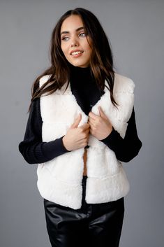 DetailsA faux fur vest featuring a v-neckline and a open front.Model is wearing a size Small. Content + Care- 100% Polyester- Hand or machine wash cold Size + Fit Measurements taken from size Small.- Full length: 21"- Bust: 40" Faux Fur Vest Women, White Fur Vest, Fur Vest Women, White Faux Fur Vest, Fur Vests, Vest Women, Faux Fur Vest, White Faux Fur, White Fur