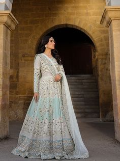 Pakistani Bridal Dress in Premium Gown Dupatta Style is a stunning attire that has the perfect balance of elegance and tradition. Hand-crafted embellishments, motifs, and shimmering details make this Pakistani Bridal Gown your foremost priority for the wedding. Pakistani Bridal Gown: Pakistani Bridal Gown has an alluring sea green color and it has a premium raw silk fabric. This Gown is gracefully emblazoned with lavish embroidery, jaal work, applique, and silver details. Intricate designs and f Bridal Gown Pakistani, Pakistani Bridal Gown, Gown Pakistani, Wedding Dresses Pakistani, Pakistani Bridal Dress, Dupatta Style, Raw Silk Fabric, Silk Bottoms, Pakistani Bridal Dresses