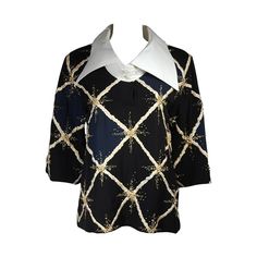 This Pierre Balmain blouse is composed of a navy, black, and white patterned silk with embellishments. The linen collar is fused for a three dimensional effect, which causes it to sit up right. The embellishments are small gold beads. In excellent condition. Measures (Approximately) Length: 27" Center back Sleeve: 17" Shoulder to shoulder: 17" Bust: 38" Waist: 42" Balmain Couture, Exaggerated Collar, Afternoon Dress, Embellished Blouse, 1920s Dress, Pierre Balmain, Couture Sewing, Edwardian Fashion, Sit Up