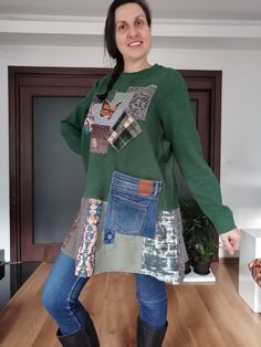 a woman standing on top of a wooden floor