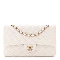 This is an authentic CHANEL Caviar Quilted Medium Double Flap in White. This stunning shoulder bag is crafted of diamond quilted luxurious caviar leather in white. The bag features polished light gold chain link leather threaded shoulder straps, a rear patch pocket, and a facing polished light gold Chanel CC turn lock. This opens to a matte white leather interior with patch pockets. Rainbow Boys, Classic Phones, Chanel Double Flap, Chanel Flap Bag, Denim Quilt, Light Backpack, Gold Chanel, Chanel Shoulder Bag, Leather Thread