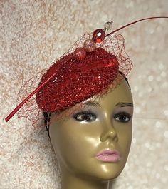 Red Fascinator Half Hat for Church, Tea Party, Weddings, and Special Occasions.  Beaded lace half hat trimmed with feather stem and hat pin. Red Head covering for church and headwear. Size  Hat measures 5.9 inches in diameter. SHIPPING All items for free shipping will be shipped via USPS FIRST CLASS MAIL. Gifts for mom, sister, wife, or yourself. Fitted Mini Hats For Holiday Parties, Red Carnival Party Costume Hats And Headpieces, Red Carnival Costume Hats And Headpieces For Party, Handmade Red Party Hat, Elegant Red Top Hat For Party, Elegant Handmade Hat For Gift, Elegant Handmade Hat As A Gift, Handmade Elegant Hat As Gift, Fitted Wedding Fascinator For Carnival