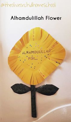 a paper flower with the words alhamdullillah flower written on it