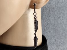 One Feather earring, Long feather earring, Gunmetal feather clip-on, Non pierced, For Men, Earring feather, Unisex feather dangle, Talisman dangle, Gift for men, Unisex dangle gift, Boyfriend gift One long gunmetal feather clip-on earring with gunmetal chain gunmetal clip-on hook ( in the picture ) total length 2 3/4 Inches ( 7 cm ) Clip-on size 14 mm The clip-on hook is also suitable for ears without a hole Feathers are a reminder to count our blessings and be thankful for the good stuff going Tomboy Earrings, Dangly Earrings Men Feather, Elegant Black Feather Jewelry, Black Feather Earrings, Elegant Adjustable Feather Earrings, Festival Feather Dangle Jewelry, Best Friend Texts, Earring Long, Ear Cuff Jewelry