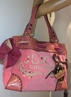 Rare Authentic High-Quality Vintage JUICY COUTURE Baby Pink Velour Day Dreamer Bag, Fashion y2k Hand Bag, Vintage Juicy Bag, Gift for Her Excellent Condition Vintage Brown and Pink Juicy Couture Bag with Charm Excellent condition despite being vintage, as it's been well preserved, no scuffs or tears or any peeling as seen in the photos.  Baby Pink Velour Bag with Large Hearth Charm Please see more Juicy Couture bags here: https://www.etsy.com/uk/shop/TopGiftables?ref=seller-platform-mcnav&sectio Y2k Style Leather Bag For Daily Use, Y2k Leather Bag For Daily Use, Y2k Pink Shoulder Bag, Pink Vintage Shoulder Bag With Handles, Vintage Pink Shoulder Bag With Handles, Pink Y2k Bag For Everyday Use, Y2k Style Pink Bag For Everyday Use, Pink Y2k Shoulder Bag For Daily Use, Pink Y2k Rectangular Bag